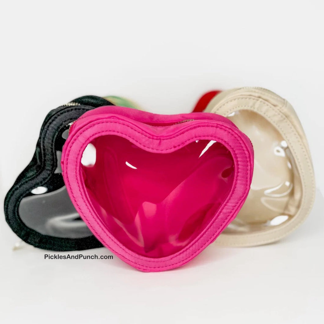 heart shaped zipper bag Details:  * Made of Nylon * Gold Hardware * See through opening * Approx. 6.7 x 5.7 x 2.2 inches