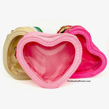 Load image into Gallery viewer, heart shaped zippered bag Details:  * Made of Nylon * Gold Hardware * See through opening * Approx. 6.7 x 5.7 x 2.2 inches light pink