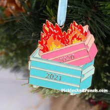 Load image into Gallery viewer,  Did you get in on the dumpster fire ornament last year?  Well, it&#39;s been another trashy year, so we&#39;ll commemorate it with a dumpster fire in a dumpster ornament! Mugsby 2020 dumpster fire 2021 ornament