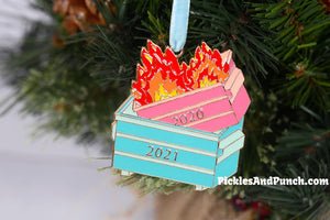  Did you get in on the dumpster fire ornament last year?  Well, it's been another trashy year, so we'll commemorate it with a dumpster fire in a dumpster ornament! Mugsby 2020 dumpster fire 2021 ornament