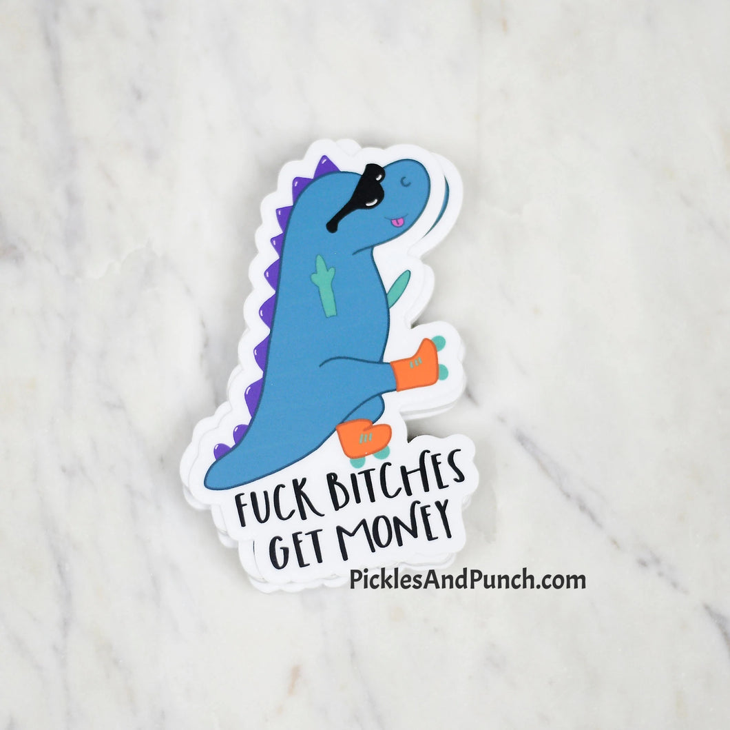 F*ck Bitches Get Money Dinosaur Sticker Decal  Save $$ by bundling!  1 for $4, 2 for $7, and 3 for $9.75  Largest side of sticker is approx. 4 inches Durable laminate vinyl  Laminate vinyl is weatherproof and protects from rain and sunlight, as well as scratching Put these vinyl stickers on drinkware, laptops, notebooks, etc! fuck