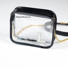 Load image into Gallery viewer, Black - Clear CrossBody Stadium Style Bag  Perfect for those venues that require a small and/or see-thru bag.  Accessorize your outfit for your next sporting event, concert, or fair/festival!  Details:  * 7.5 in x 6.5 in  x 2.5 in gusset * Made of PU leather * Gold chain included * Straps can be removed (use it as a clutch or add your own style strap)