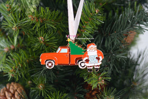 Oh no!  Santa's Out of Gas in his Vintage Old Timey Pickup Truck with Christmas Tree in the Back.  PREORDERS WILL NOT ARRIVE UNTIL MID TO LATE OCTOBER.  PLEASE PUT ALL PREORDERS ON THEIR OWN ORDER, OTHERWISE YOUR OTHER ITEMS WILL WAIT TO SHIP UNTIL YOUR ORNAMENT(S) COME IN.  THANK YOU!   Soft enamel with a gold metal backing * Measures about 3 inches in height * velvet ribbon to hang (Color may change from our sample image color)