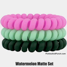 Load image into Gallery viewer, watermelon matte Hotlines are the BEST hair ties. We might be biased, but once you try them, you&#39;ll agree! They&#39;re ouchless &amp; creaseless. Our coil hair tie design won&#39;t give you a headache because they don&#39;t pull on your roots!