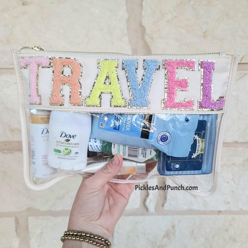 TRAVEL - Nylon Bag   Easily collect all your travel needs in this perfectly sized bag!  Now that you have that taken care of, where are we going?!  Details: Made of nylon Inside lining matching outside color Gold zipper  Measurements: Clear: 11.5 x 8  travel bag organizer