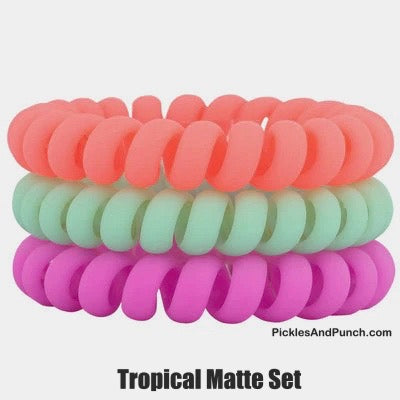 Hotlines are the BEST hair ties. We might be biased, but once you try them, you'll agree! They're ouchless & creaseless. Our coil hair tie design won't give you a headache because they don't pull on your roots! tropical matte colors